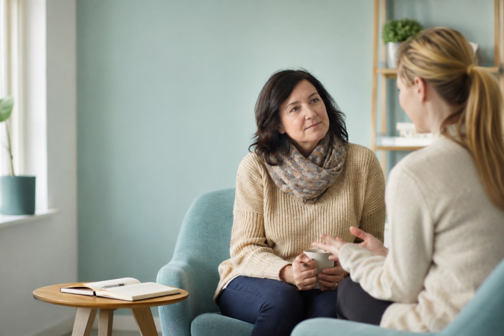 Patient talking with a healthcare professional about support and treatment choices